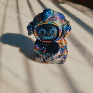 Baby Robot holding Moon Model